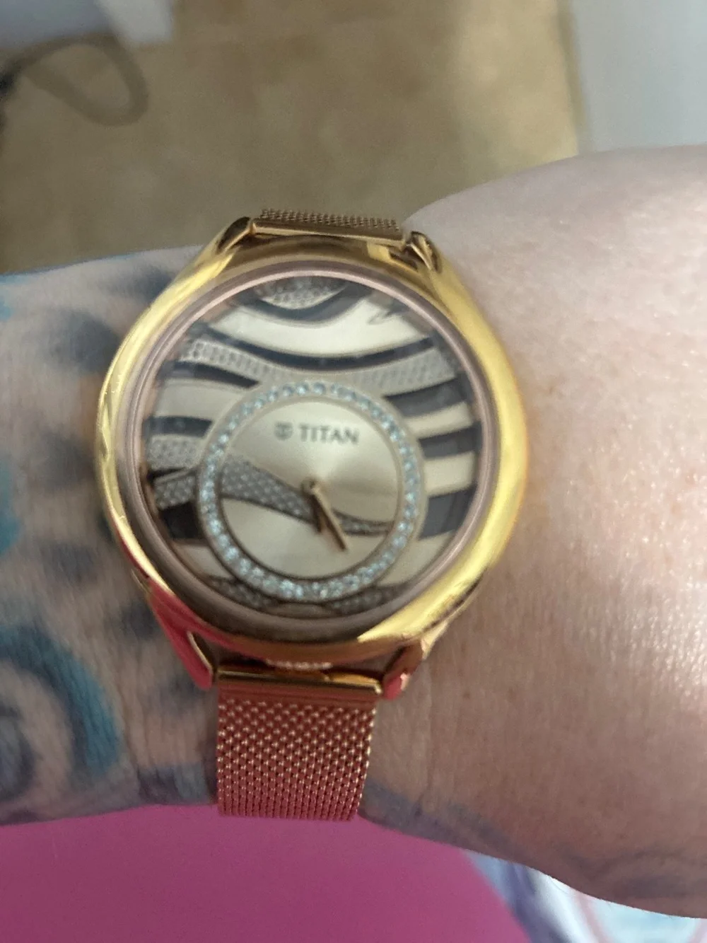 Brand new gold zebra face Titan watch